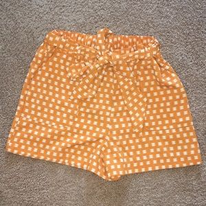 High waisted yellow shorts